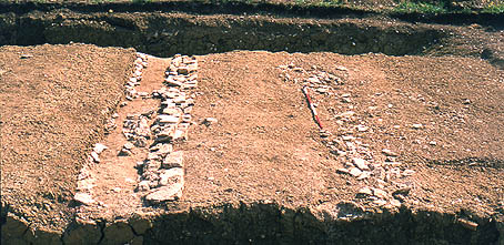 Area 3, the stone wall and berm excavated.