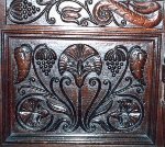 Carved wooden chair back