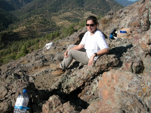 Figure 7: Archaeometallurgist Vasiliki Kassianidou by an ancient mining adit (TP184) on Alestos, 23 July 2003. Photograph: Thomas Tselios. 