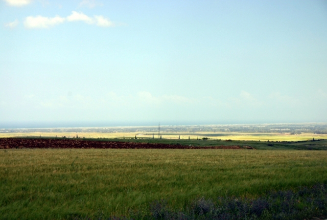 Figure 42: Potami Kambos tou Lemonari (TP095), an early prehistoric lithics scatter (in the foreground), looking north-west towards the Bay of Morphou. Photograph: Michael Given. 