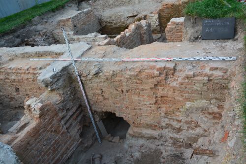 the remains of a building in an archaeological excavation