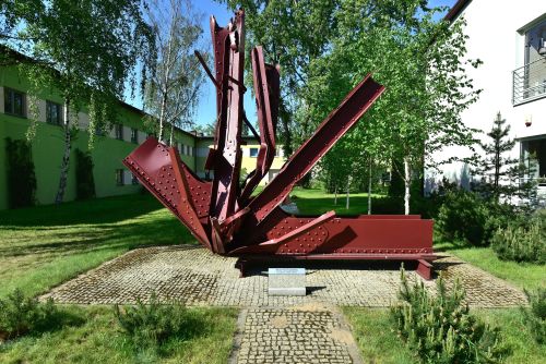 girder remains of a bridge on display in a museum