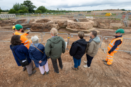 Photo of a group on site, taken from behind